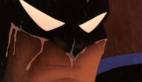 Batman in the rain, standing in for the demotivation after the duplicate
